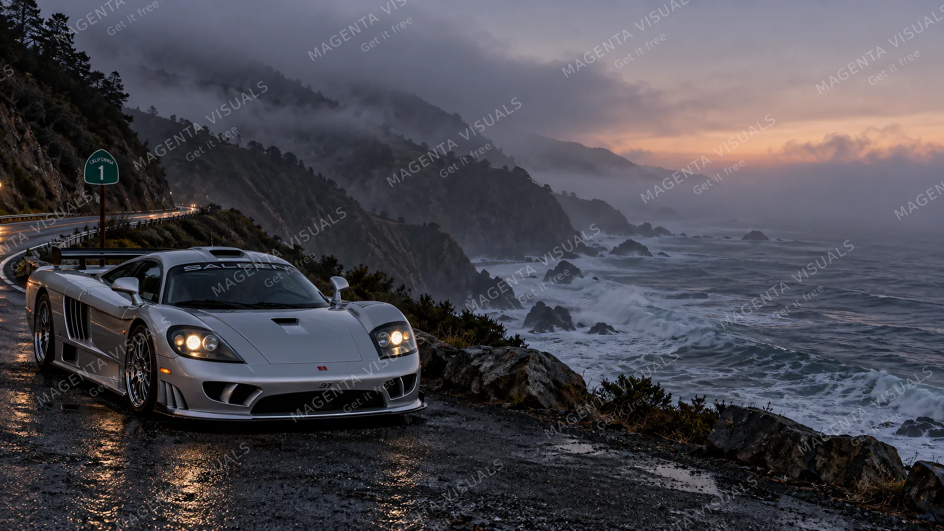 4K wallpaper of A sleek metallic silver Saleen S7 twin turbo parked along the rugged cliffside shoulder of Highway 1 on the left at misty twilight.