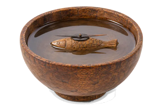 4K transparent cutout of product photography of a single ancient wooden-float compass, a small carved wooden bowl filled with water holding a floating wooden fish figure carrying a magnetized iron needle,…