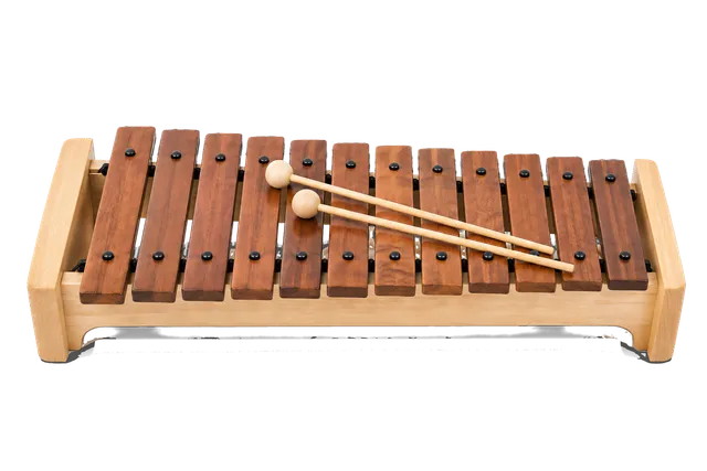 4K transparent cutout of product photography of a single xylophone with wooden tone bars and mallets resting on it, isolated object, entire subject visible, centered in frame, pure white background, seaml…