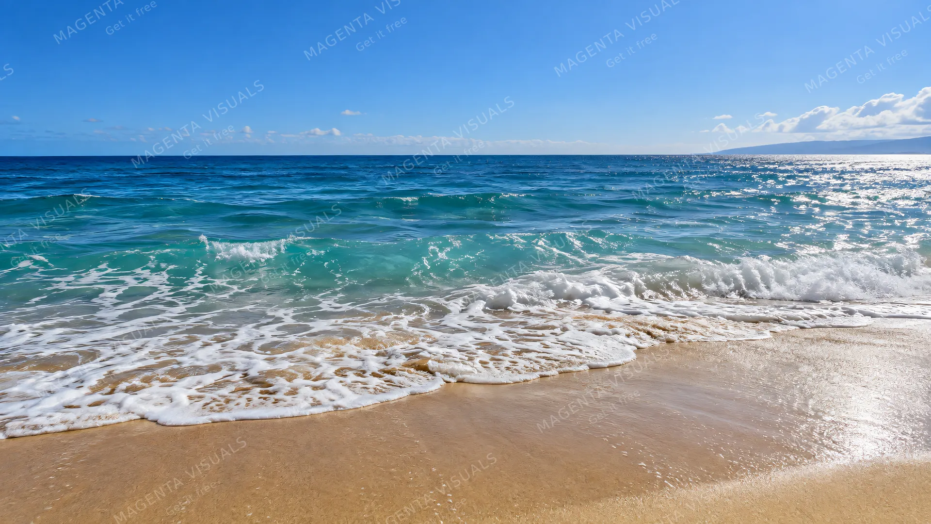 4K 16:9 widescreen photoreal photograph of deep blue and turquoise ocean waters stretching out to a clear distant horizon viewed from a pristine sandy beach under bright natural sunl…